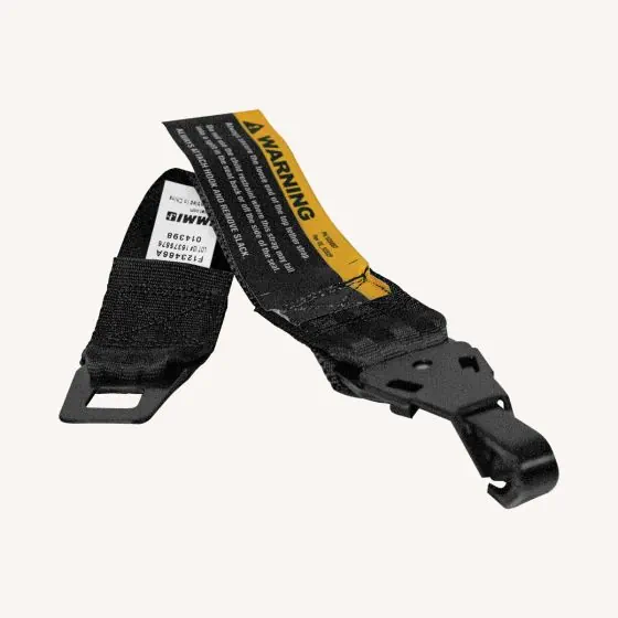 Baby capsule tether strap outlet